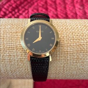 Gucci Women’s Watch with Black Dial and Gold Bezel EUC